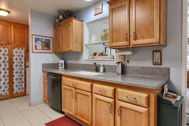 kitchen featuring dishwasher, light tile patterned floors, and a sink