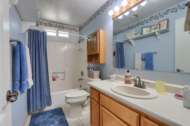 bathroom featuring vanity, visible vents, shower / bath combo, tile patterned flooring, and toilet