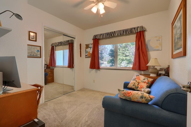 interior space featuring a healthy amount of sunlight and ceiling fan