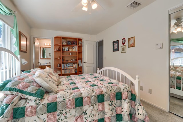 bedroom with visible vents, ceiling fan, and carpet flooring