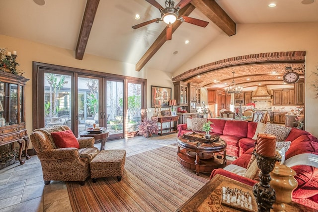 living room featuring french doors, ceiling fan with notable chandelier, and vaulted ceiling with beams