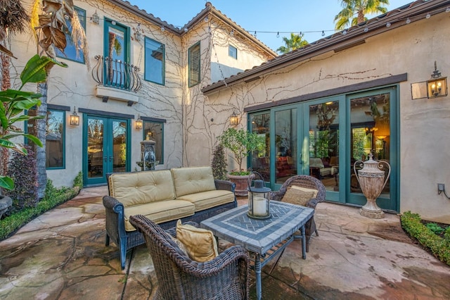 view of patio / terrace featuring an outdoor hangout area and french doors