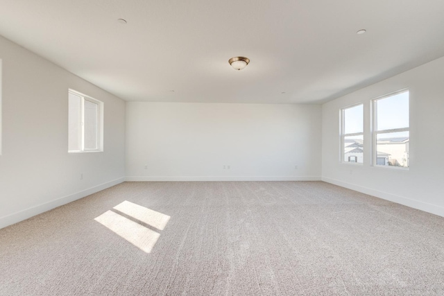 661 Lucas Ave S, Madera, CA 93636 - unfurnished room with baseboards and light colored carpet