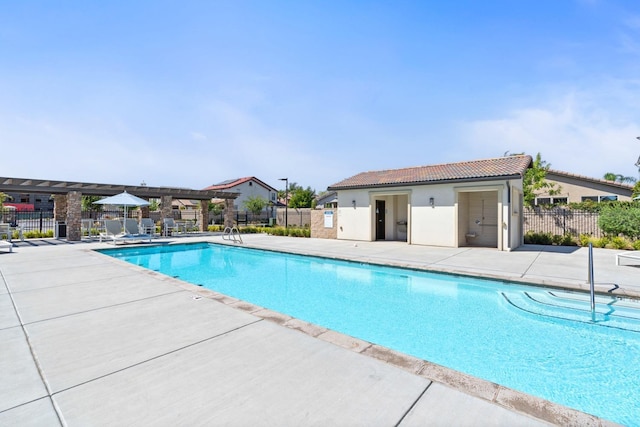 view of pool featuring a patio area and a pergola