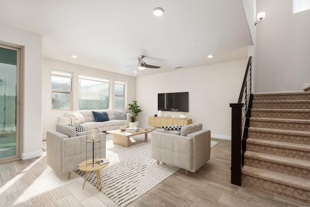 living room featuring ceiling fan