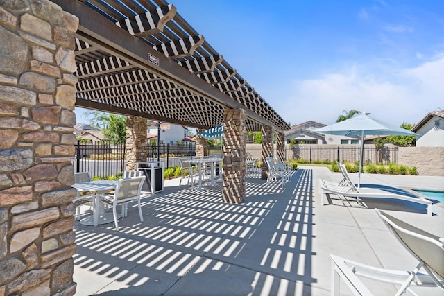 view of patio featuring a pergola