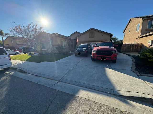 single story home featuring a garage