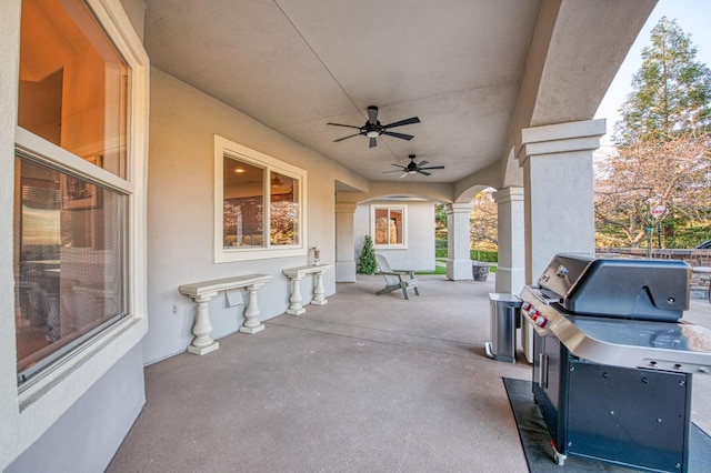 view of patio / terrace with a grill and ceiling fan