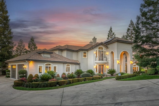 21998 Brighton Crest Dr, Friant, CA 93626 - mediterranean / spanish house with a garage and a balcony