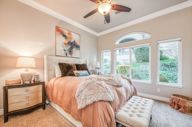 carpeted bedroom with crown molding and ceiling fan