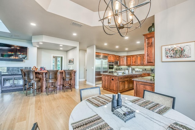 dining space featuring light hardwood / wood-style floors