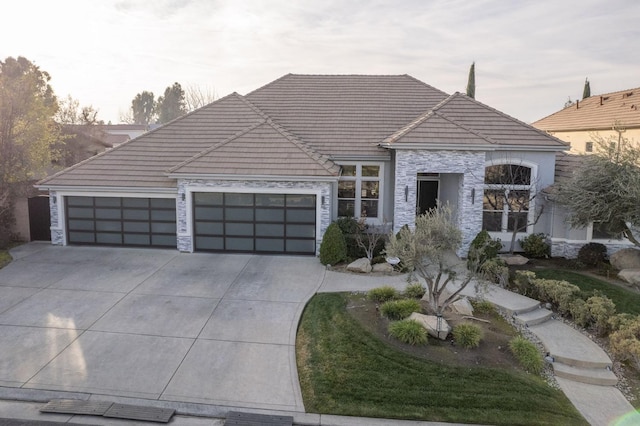 view of front of home with a garage