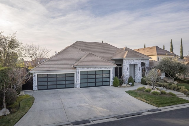 view of front of property with a garage