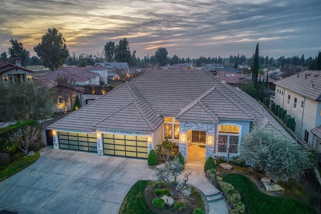 view of front of property featuring a garage