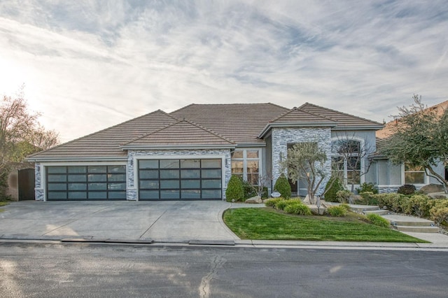 view of front of property with a garage