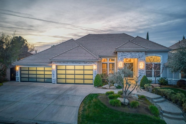 view of front of home with a garage