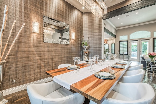 dining room featuring french doors, ornamental molding, and hardwood / wood-style flooring