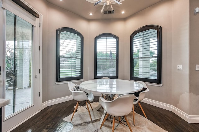 dining area featuring dark hardwood / wood-style flooring