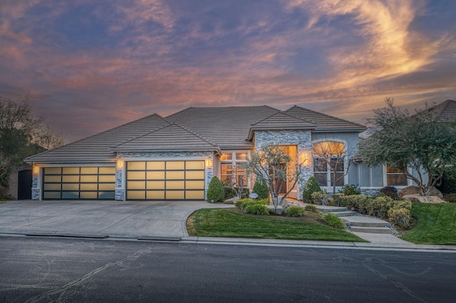 view of front of property featuring a garage