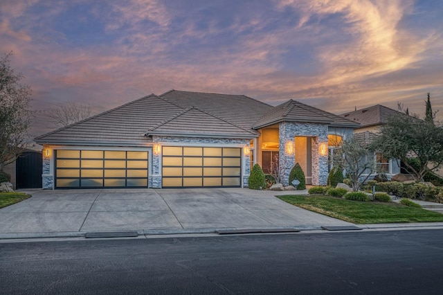 view of front of property with a garage