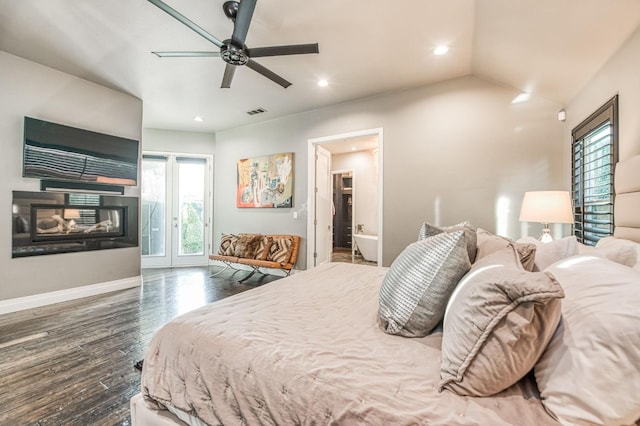 bedroom featuring lofted ceiling, access to outside, a multi sided fireplace, dark hardwood / wood-style floors, and ceiling fan