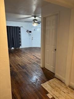 hallway with wood-type flooring