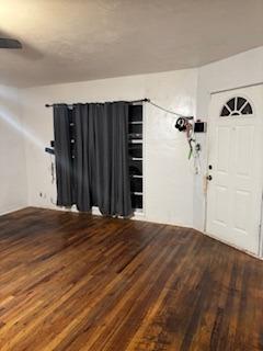 foyer entrance with hardwood / wood-style floors