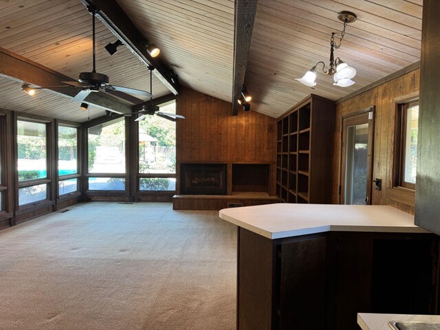 1590 W Escalon, Fresno, CA 93711 - carpeted living room featuring rail lighting, vaulted ceiling, wooden walls, wooden ceiling, and a fireplace