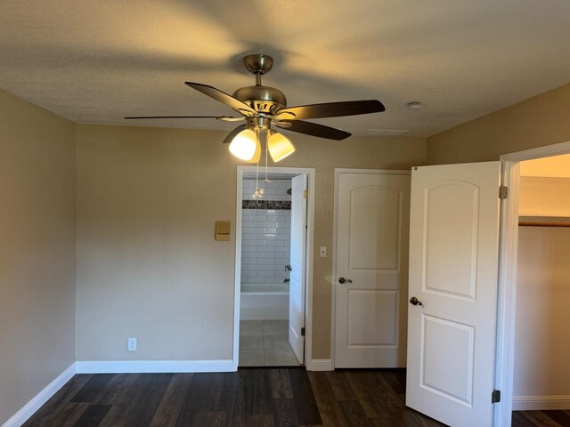 1590 W Escalon, Fresno, CA 93711 - unfurnished bedroom featuring dark wood-type flooring, ensuite bath, and ceiling fan