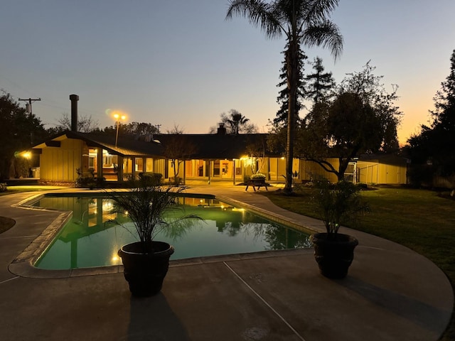 1590 W Escalon, Fresno, CA 93711 - outdoor pool with a patio area and an outbuilding