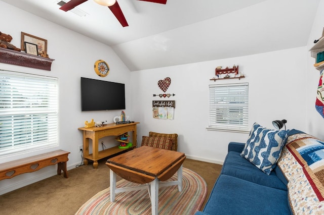 carpeted living room with vaulted ceiling and ceiling fan