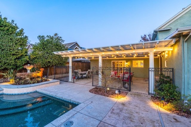 exterior space with a pergola and a patio area