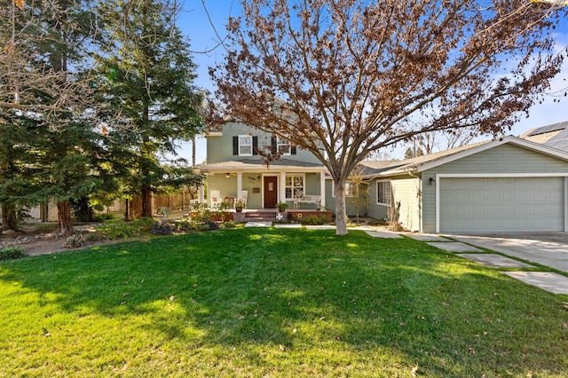 view of front of property with a garage, a front lawn, and covered porch