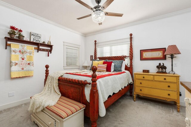 bedroom featuring ceiling fan, ornamental molding, and light carpet