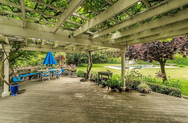 3670 S Newmark Ave, Sanger, CA 93654 - deck featuring a pergola, a lawn, and outdoor dining area