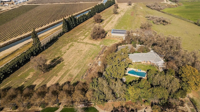 3670 S Newmark Ave, Sanger, CA 93654 - aerial overview of property's location with rural landscape, large plots for crops, and a pool