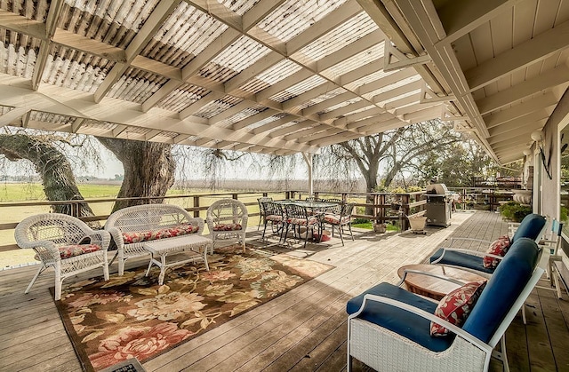 3670 S Newmark Ave, Sanger, CA 93654 - wooden deck featuring outdoor dining area and a pergola