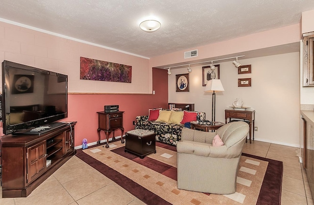 3670 S Newmark Ave, Sanger, CA 93654 - living area featuring tile patterned flooring and a textured ceiling