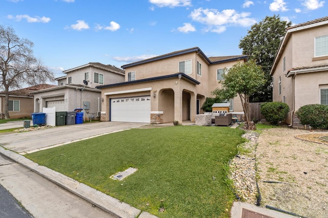 view of front of property with a garage and a front lawn