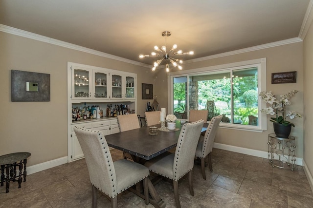 dining space featuring ornamental molding and a notable chandelier