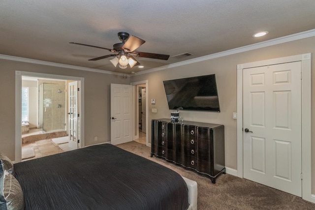 bedroom with ensuite bath, ornamental molding, light colored carpet, and ceiling fan