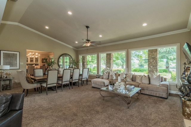 carpeted living room featuring ceiling fan with notable chandelier, ornamental molding, and vaulted ceiling