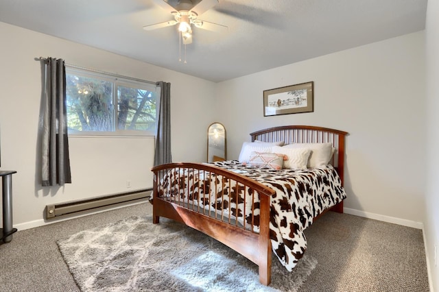 carpeted bedroom with ceiling fan and baseboard heating