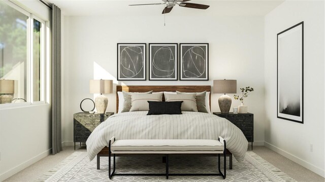 bedroom featuring light carpet and ceiling fan