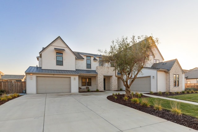 view of front of property with a garage