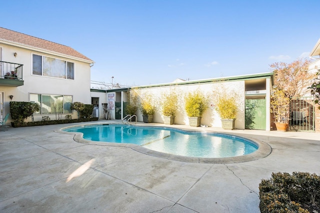 view of pool with a patio