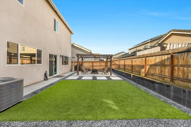 view of yard with cooling unit, a pergola, and a patio