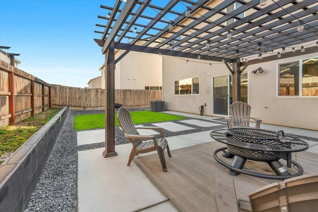 view of patio with cooling unit and a pergola