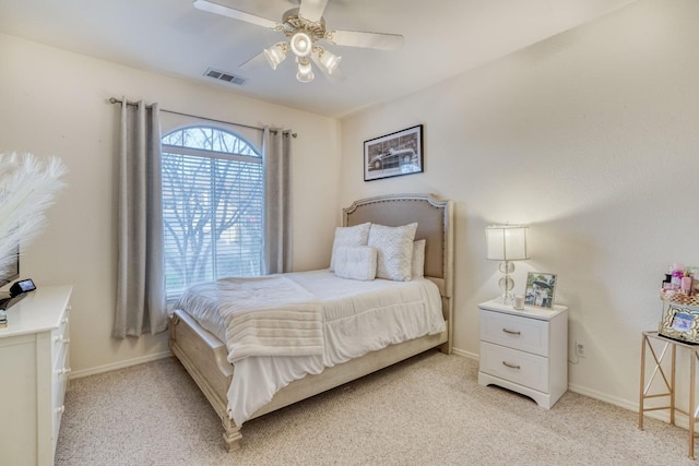 bedroom with light carpet and ceiling fan