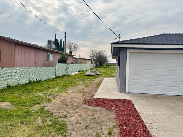 view of yard featuring central AC